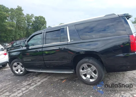 2015 Chevrolet Suburban 1500 Ltz from USA, damaged, VIN 1GNSCKKC7FR185260